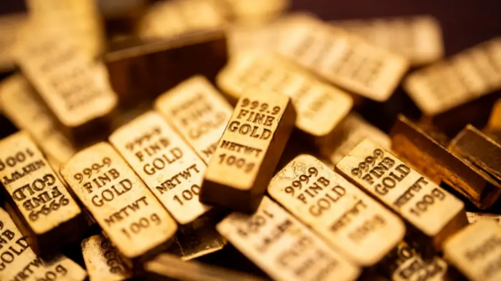 Vàng, chứng khoán Mỹ biến động sau động thái của Fed